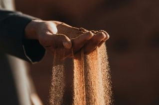hand holding sand